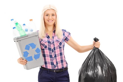 Professional movers handling office equipment during a commercial move